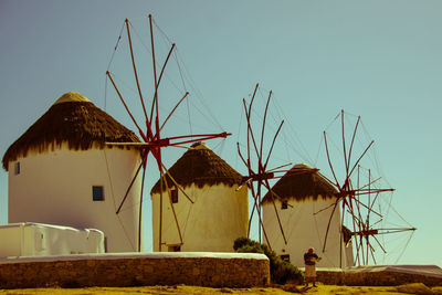 Traditional windmills against clear sky