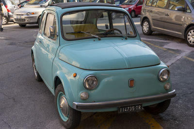 Vintage car on road in city