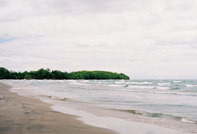 Scenic view of beach against sky