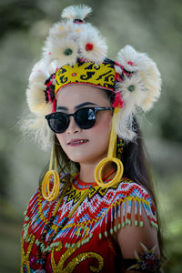 Portrait of young woman wearing mask