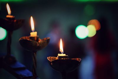 Close-up of lit tea light candle