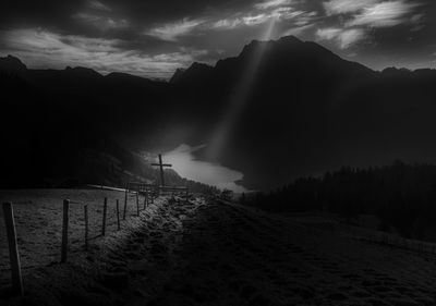 Scenic view of snowcapped mountains against sky during winter