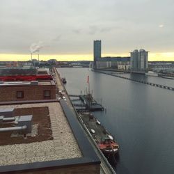 View of harbor against sky during sunset