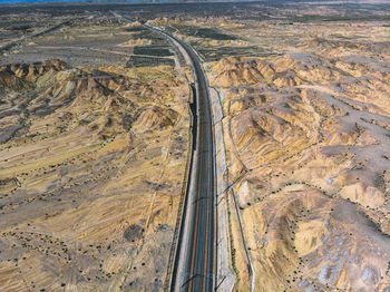 High angle view of road amidst land