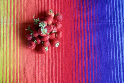 Close-up of red berries on table