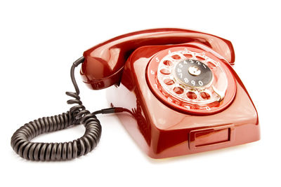 Close-up of telephone on table