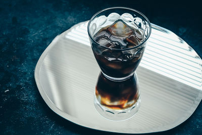 High angle view of beer in glass on table