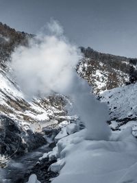 Snow covered mountain against sky