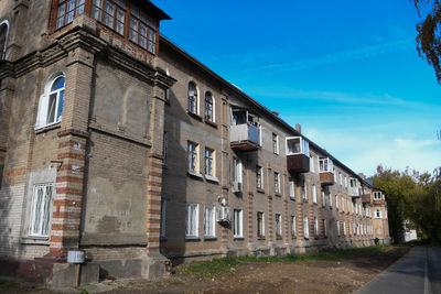 Low angle view of residential building against sky