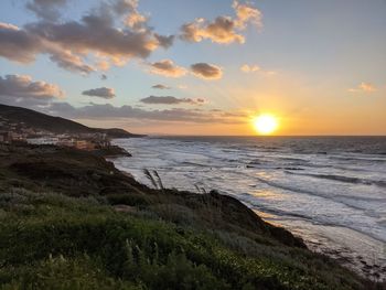 Scenic view of sea against sky during sunset