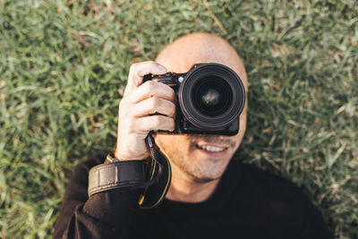 Portrait of man photographing