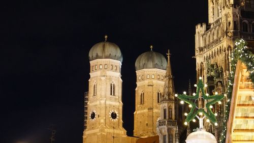 Illuminated cathedral against sky at night