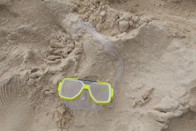 High angle view of text on sand at beach