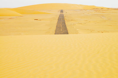 Scenic view of desert against sky