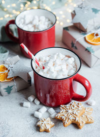 Cozy winter and christmas setting with hot cocoa and homemade cookies