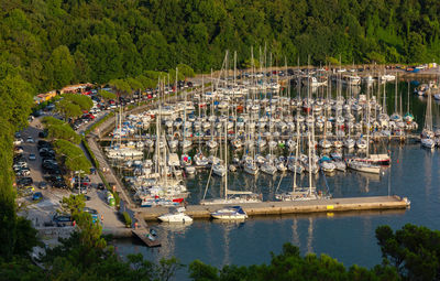 High angle view of boats moored at harbor