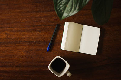 High angle view of coffee cup on table