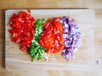 High angle view of chopped vegetables on cutting board