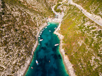 Aerial view of sea and landscape against sky