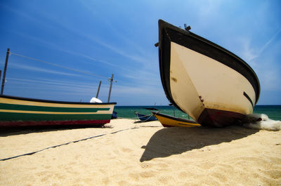 Boats on sunny beach