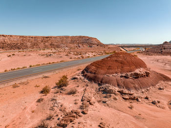 Northern arizona highway through red rocks and landscape.