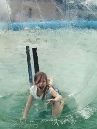 Young woman in water