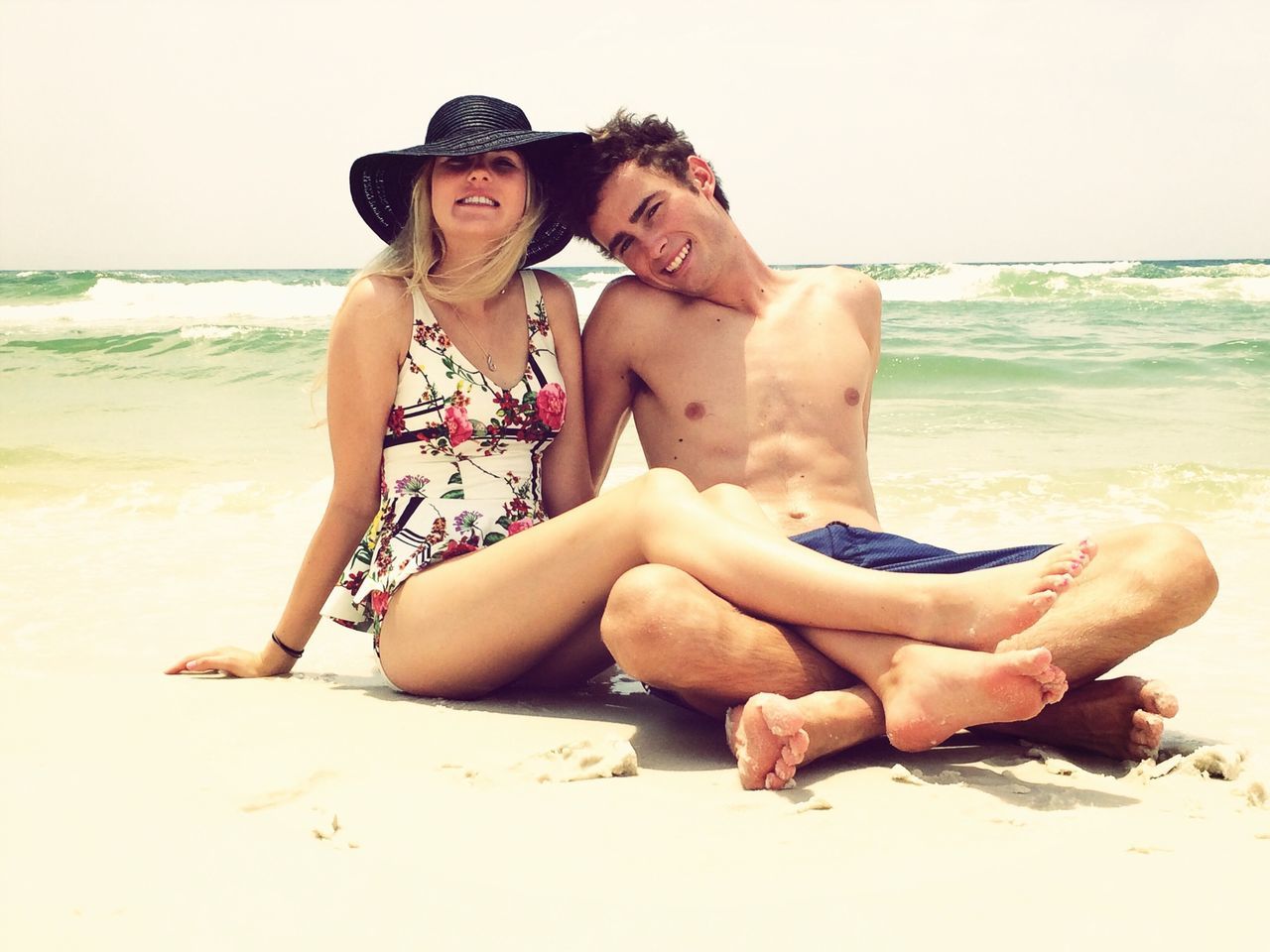 beach, sea, person, water, shore, young adult, sand, leisure activity, lifestyles, horizon over water, full length, vacations, looking at camera, portrait, young women, clear sky, shirtless