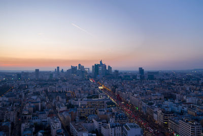 High angle view of city buildings during sunset