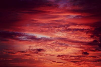 Low angle view of dramatic sky during sunset