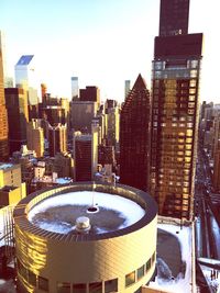 High angle view of city at sunset