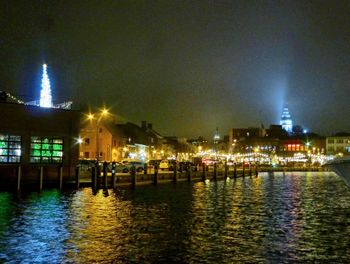 Illuminated buildings in city at night