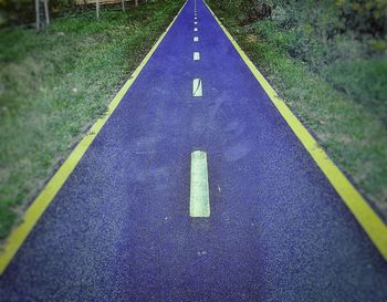 High angle view of arrow sign on road