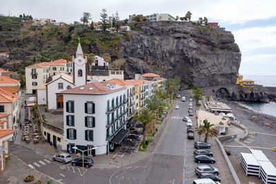 High angle view of street amidst buildings in city