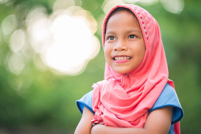 Portrait of cute girl smiling