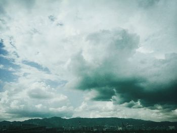 Cloudy sky above city