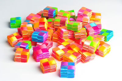 High angle view of toys on table against white background