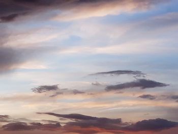 Low angle view of clouds in sky during sunset