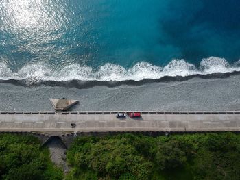 High angle view of road by sea