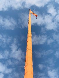 Low angle view of smoke stack against sky