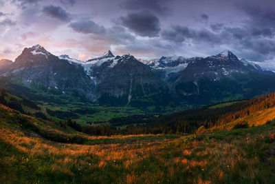 Scenic view of snowcapped mountains against sky