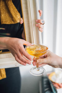 Sharing a gold glitter cocktail