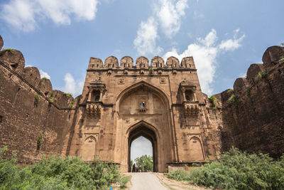 Low angle view of old ruin building against sky