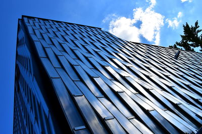 Low angle view of modern building against sky