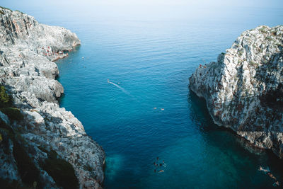 High angle view of sea and rocks