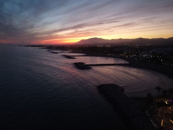 Scenic view of sea against sky at sunset