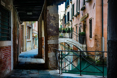 Alley amidst buildings in city