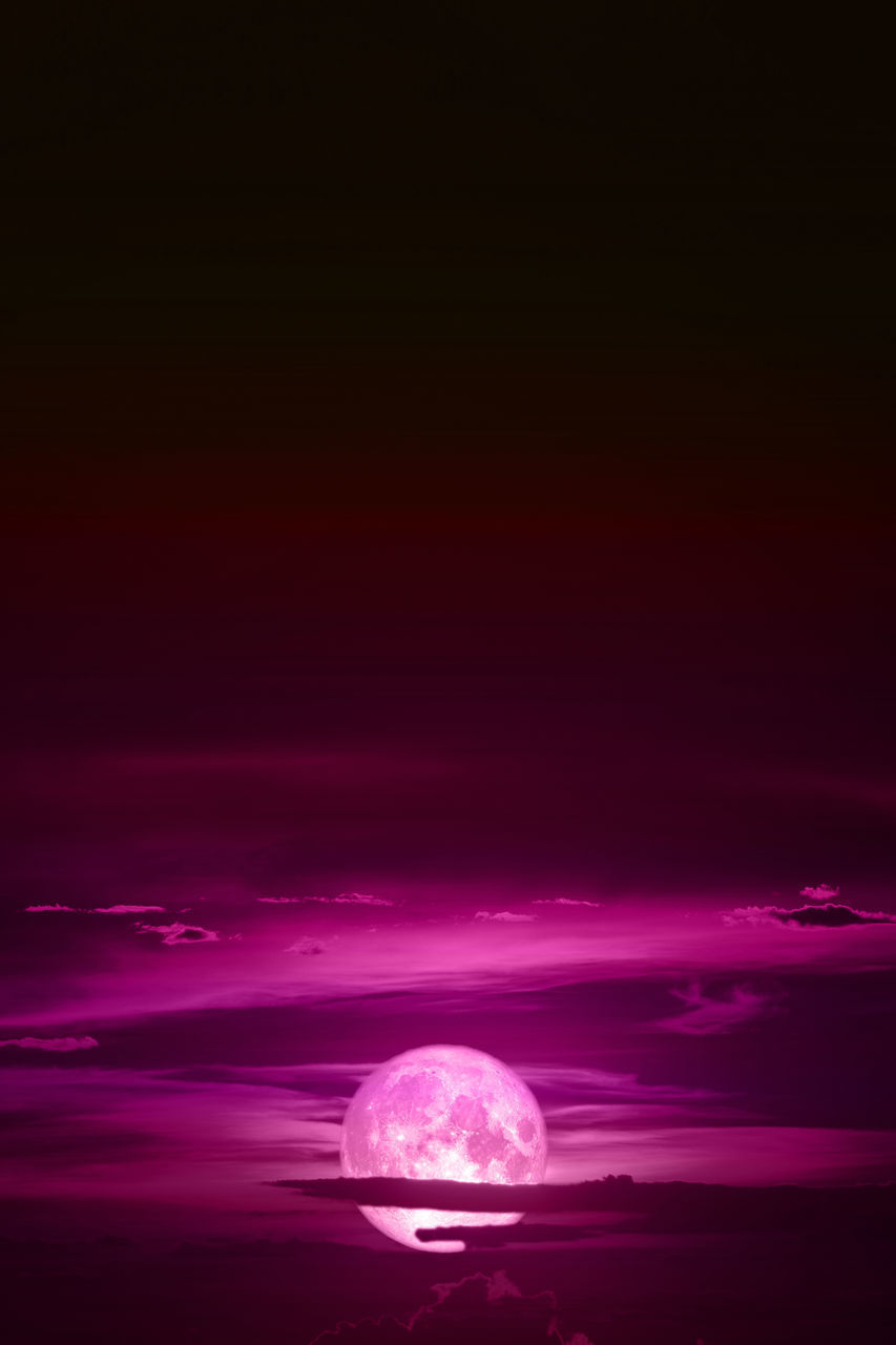 SCENIC VIEW OF PINK WATER AT NIGHT