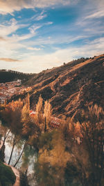 Aerial view of town by lake during autumn