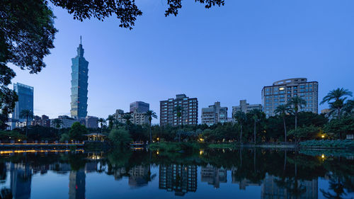 Reflection of buildings in lake