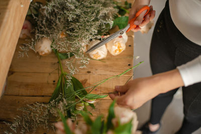 Midsection of woman preparing food